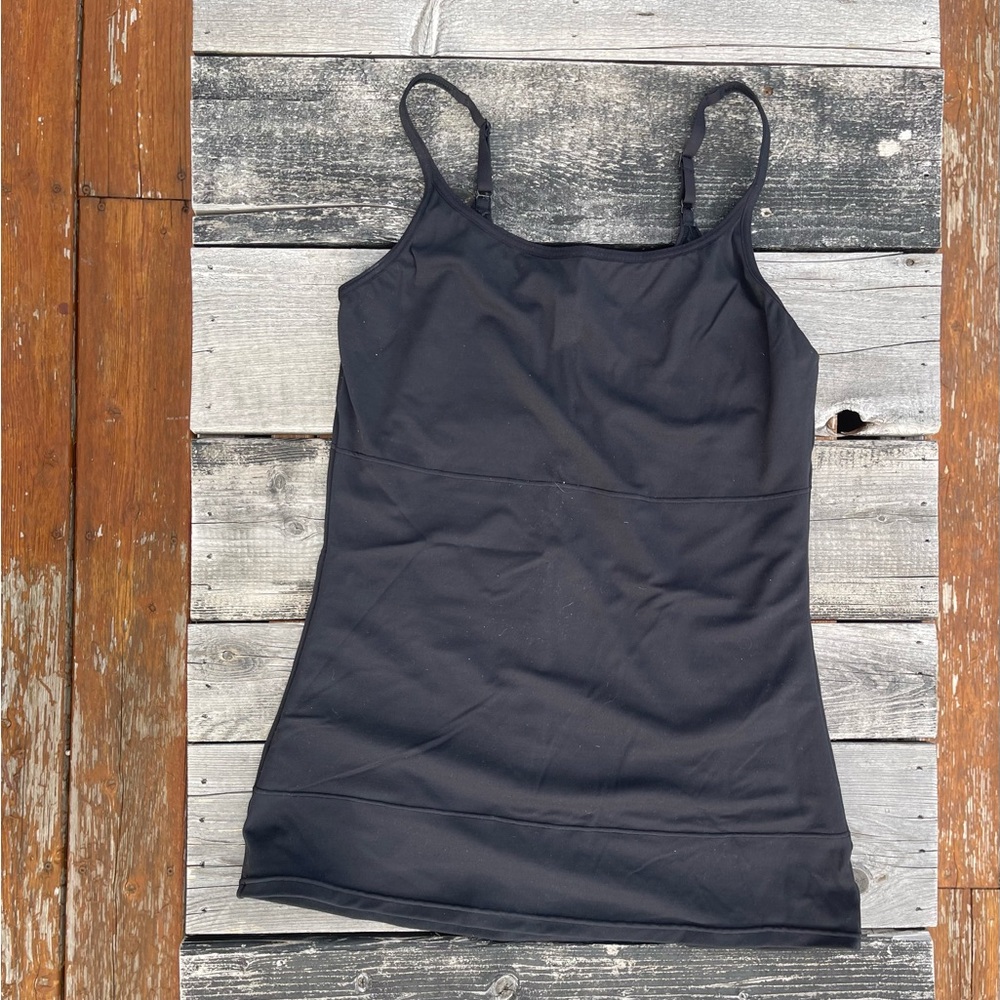 Black fitted “slimming” tank top